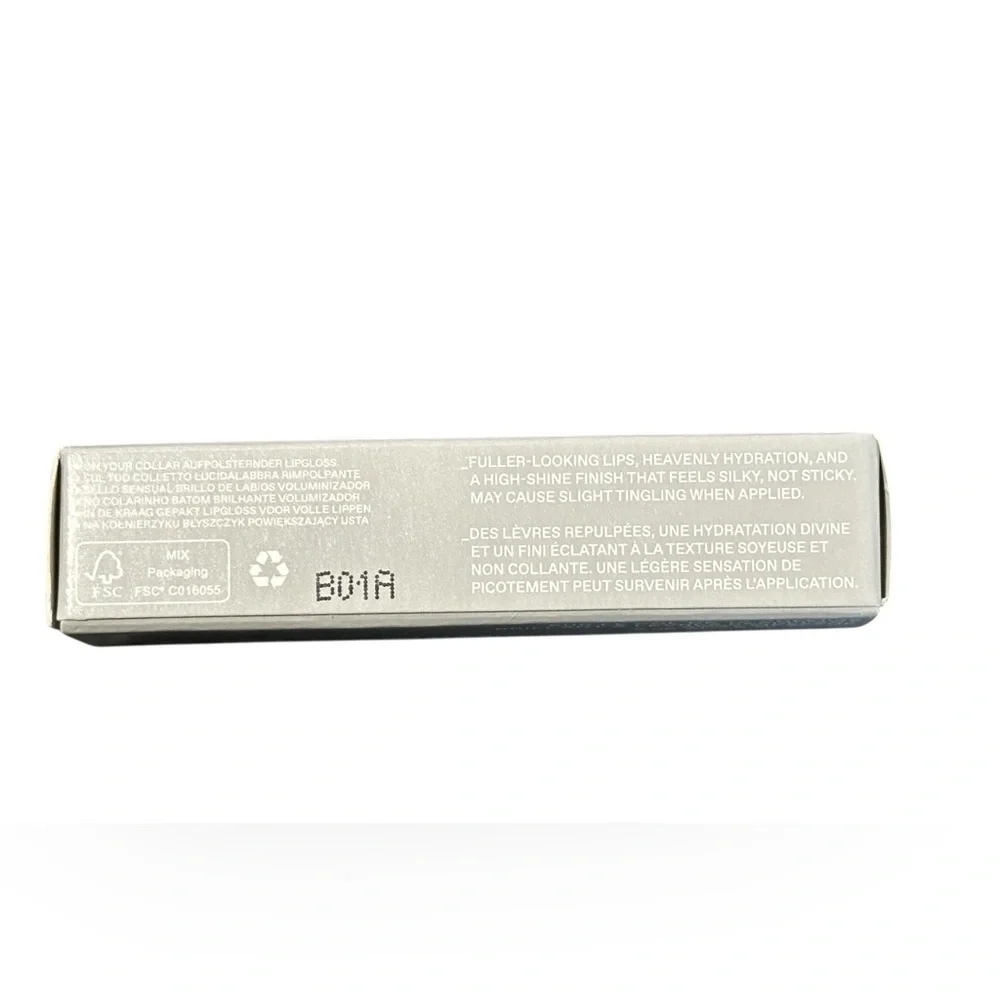 R.e.m. NIB Beauty On Your Collar Plumping Lip Gloss Shade Away Message